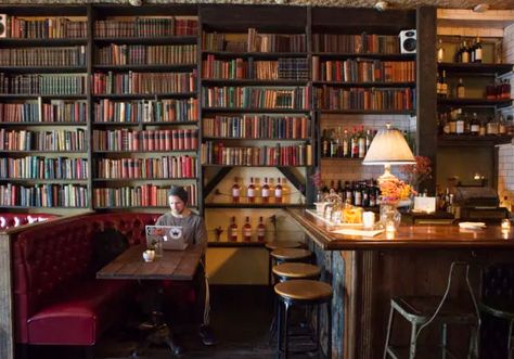 11 Bookish Cafes & Restaurants Around the World Vintage Bookshelves, Bookshop Café, Antique Cafe, Bookstore Design, Library Cafe, Vintage Bookshelf, Bookstore Cafe, Vintage Bookcase, Bg Design