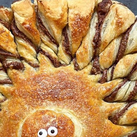 Sarah Fowler on Instagram: "Nutella & puff pastry turkey 🦃 I’ve made something with this combination of ingredients for just about every holiday except Thanksgiving - until now! How cute is this little guy? He couldn’t be easier to throw together and the “feathers” are the perfect little grab-and-go snack. Note: you can make these cute turkeys with savory spreads if you prefer, we love it with basil pesto! Ingredients 2 sheets puff pastry, thawed 1/3 cup Nutella 1 egg, beaten 1 tbsp Turbinado sugar (optional but I like the crunch!) Directions Heat oven to 400°. Lay out one of the sheets of puff pastry on parchment paper and spread Nutella on top, leaving the corners plain. Lay the second sheet on top. Cut into a semi circle and set aside the excess pastry (you’ll use this to finish the Nutella Turkey, Nutella Puff Pastry Turkey, Nutella Puff Pastry Thanksgiving, Nutella Christmas Puff Pastry, Puff Pastry Nutella Gingerbread, Puff Pastry Nutella Christmas Tree, Christmas Tree Pastry Nutella, Nutella Puff Pastry, Turkey Pie