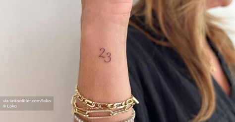 Tattoo of the number "23" located on the wrist. Number 23 Tattoo, 23 Tattoo, Hair Stenciling, Number Tattoos, Tattoo Arm, Tattoo Cover-up, Tattoo Meaning, Cover Up Tattoos, Little Tattoos