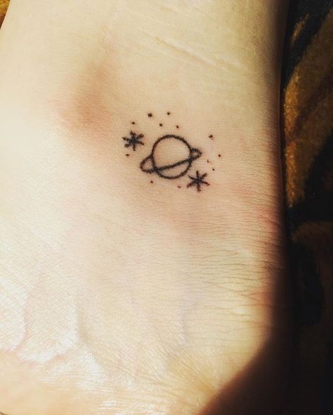 New Little planet Tattoo #saturntattoo #youngartist #hanpoked #handpoke #sticknpoke #sticknpoketattoo #handpoketattooartist #universe #stars Tiny Planet Tattoos, Planet Tattoo, Saturn Tattoo, Planet Tattoos, Sharpie Tattoos, Stick N Poke Tattoo, Small Girl Tattoos, Small Meaningful Tattoos, Bff Tattoos