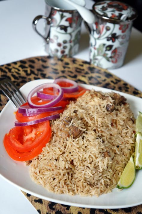 Kenyan Chicken Pilaf: Chicken Pilau Chicken Pilaf Recipe, Chicken Pilau, Pilau Recipe, Chicken Pilaf, Tanzania Food, Kenyan Food, Chicken And Rice Dishes, Pilaf Recipes, Spiced Rice