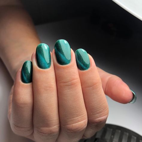 If you’re not sure what to apply to your nails but you would like to have something that is not simple, cat eye is for you. Bluish color has some blue an green effects in it. Green Cateye Nail Designs, Green Cat Eye Nails French Tip, Emerald Cat Eye Nails, Dark Green Nails Cat Eye, Spring Nails 2024 Cat Eye, Swirl Nail Art, Cat Nail Art, Different Types Of Colours, Aurora Nails