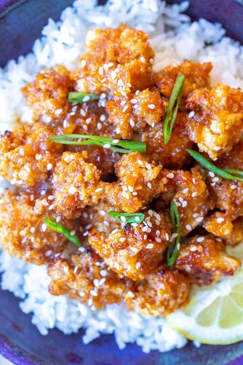 This Sticky Lemon Cauliflower is crispy, tangy and delicious! It's baked in the oven and coated with a easy homemade lemon sauce. It's the perfect vegan version of your favorite Chinese takeout meal! #lemoncauliflower #cauliflower #chinesefood #vegan Healthy Wings Recipe, Vegan Orange Chicken Recipe, Lemon Cauliflower, Cauliflower Recipes Healthy, Lean Protein Meals, Cauliflower Dishes, Chinese Takeout, Meatless Dinner, Lemon Sauce