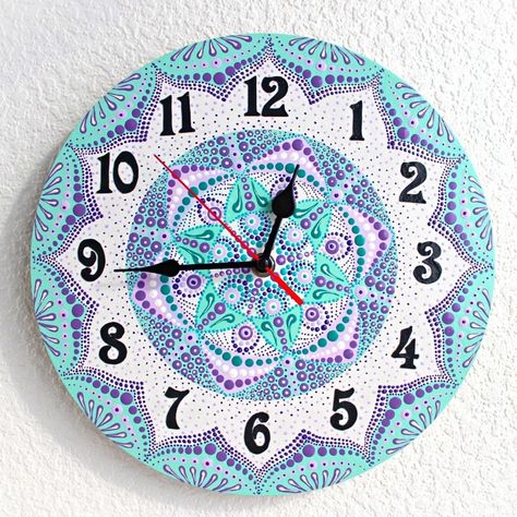 This mandala clock that I painted. This unique wall clock will add style and singularity to your living room, kitchen, bedroom or office decor. The clock is 100% handmade. Cut out of 4 mm birch plywood. Available in two diameters: ~ 10.5" (27 cm) ~ 12" (30 cm) Shipped worldwide via Russian Post. Clock Painting Ideas, Mandala On Wall, Lippan Art Wall Clock, Lippan Art Mirror Wall Clock, Clock Mandala, Mandala Clock, Dot Mandala Clock, Mandala Art Wall Clock, Clock Painting