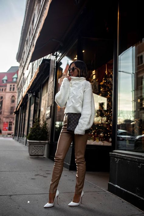 fashion blogger mia mia mine wearing a chunky white sweater from revolve with brown faux leather pants from zara. click through to see how to style leather pants, brown leather pants outfit, chic leather leggings outfit, neutral winter outfit, cozy winter looks, and casual everyday outfits. #winterfashion #womensfashion #outfitinspo #style Brown Leather Pants Outfit, Lederhosen Outfit, Mia Mia Mine, Brown Leather Pants, Leather Leggings Outfit, Look Legging, Mia Mia, Leather Pants Outfit, Brown Leggings