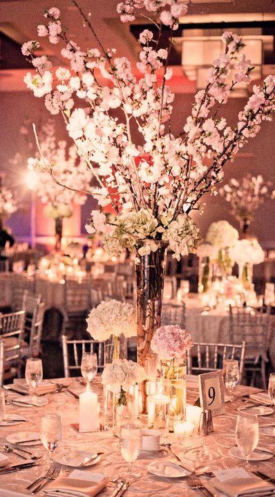 Picture Of large cherry blossom branches for a chic centerpiece Wedding Centerpieces Elegant Romantic, Wedding Table Pink, Pink Wedding Receptions, Cherry Blossom Theme, Elegant Wedding Centerpiece, Quince Decorations, Elegant Centerpiece, Wedding Reception Ideas, Quinceanera Decorations