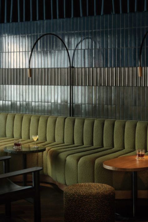 Glossy tiles and deep banquettes add a decadent feel to this dimly lit ‘speakeasy’ bar in Helsinki. Local studio Fyra designed the interiors for Bar Bardem, decking the space out in an inky blue palette that’s offset by a glowing, pale timber bar. Photography: Riikka Kantinkoski #interiors #design #interiordesign #helsinki #restaurant #bar Nordic Noir, Booth Seat, Bar Tile, Restaurant Booth, Banquet Seating, Architecture Restaurant, Speakeasy Bar, Bar Interior Design, Booth Seating