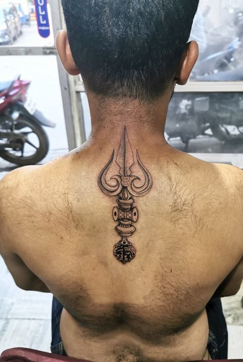 Trishul with damroo and Rudraksh tattoo, one of my finest creation, thanks sir for trusting me with, this type of work suitable for Men only. Trishul With Rudraksh Tattoo Designs, Tamil Tattoo For Men, Trishul Tattoo On Back, Arjun Tattoo, Back Neck Tattoo Men, Rudraksh Tattoo, Nepali Tattoo, Shiva Face, Tamil Tattoo