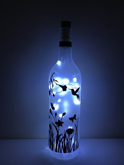 Thanks for the kind words! ★★★★★ "Aww this is amazing, bought it has a gift and the recipient loved it. It is exactly has it stated in description, I will be ordering one for myself." Amanda Andrews Bottle Diy Crafts, Hummingbird Design, Hand Painted Wine Bottles, Hummingbird Gifts, Light Up Bottles, Painted Bottles, Craft Lights, Wedding Bottles, Wine Bottle Art