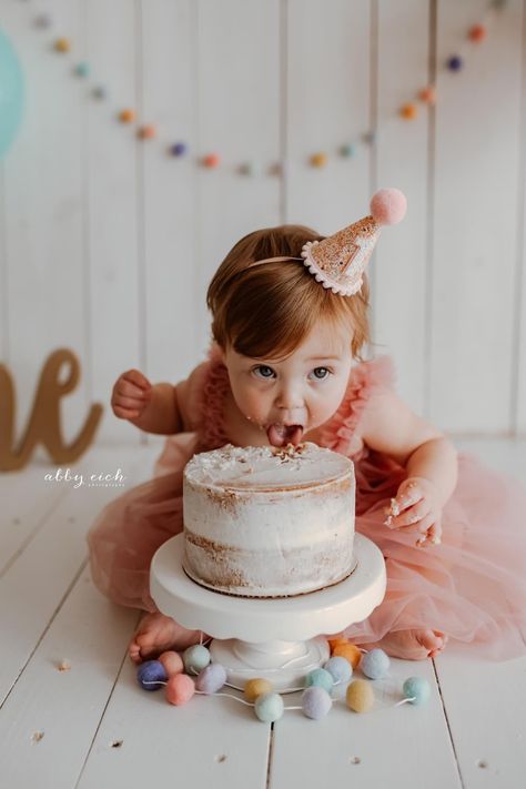 Small or Large Champane glitter hat with a blush yarn pom and blush pom trim. With or Without white glitter number backed on pale blush felt. Our party hats and crowns are attached to a comfortable elastic and meant to be worn around the back of the head, behind the ears. Tilt to the side for a fun, whimsical look! LITTLE BLUE OLIVE CROWNS and HATS are the perfect accessory for birthday celebrations, memorable photo shoots and every day fun for dress up. Hats are hand crafted of a high quality, Wildflower Birthday Party, Sprinkles Party, Cake Smash Theme, Baby Birthday Photoshoot, First Birthday Hats, 1st Birthday Photoshoot, Sprinkle Party, First Birthday Pictures, Party Photoshoot