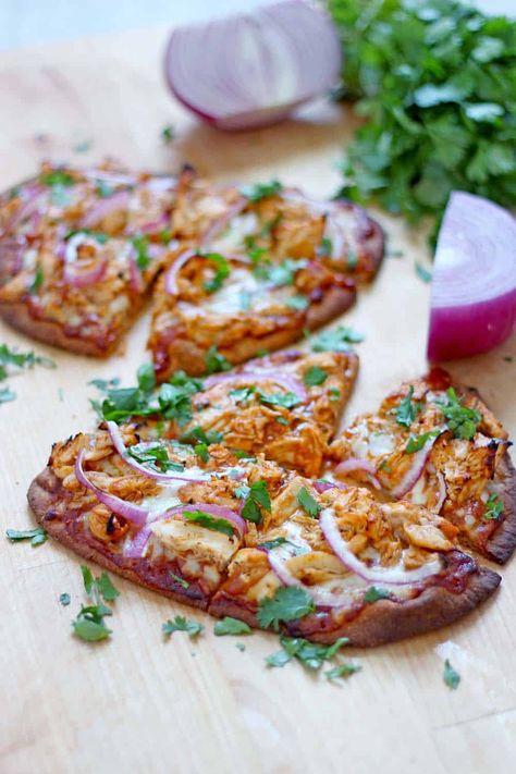 This homemade BBQ Chicken Naan Pizza is healthier than CPK's recipe, more delicious, and super quick and easy to make! This will become one of your favorite recipes. Chicken Naan Pizza, Pizza Naan, Naan Pizza Recipes, Easy Bbq Chicken, California Pizza Kitchen, Naan Pizza, California Pizza, Pizza Kitchen, Naan Recipe