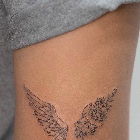 Angel Wing Tattoo On Ribs, Half Angel Wings Half Flowers Tattoo, Feminine Wing Tattoo, Half Angel Half Butterfly Tattoo, Angle Wings Tattoo Women, Tattoo Ideas Female Wings, Floral Angel Wings Tattoo, Dainty Wing Tattoo, Angel Wing Flower Tattoo