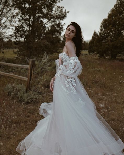 “Love is a canvas furnished by nature, and embroidered by the imagination.” ~ Voltaire “PASTORA” gown from our WILDBLOOM Collection 🌸 She’s a romantic guipure lace bustier ball gown with layers of tulle and organza and waterfalls of delicate hand appliqués. Customize “Pastora” in unlimited ways, and pair with accessories like detachable sleeves. Now available for fittings at our LA Flagship and a upcoming trunk shows! Call/text 310.595.1101 to book or with any questions! #PASTORAgown... Lauren Elaine Bridal, Detachable Sleeves, Lace Bustier, Guipure Lace, A Romantic, Ball Gown, Trunk, Ball Gowns, Lace