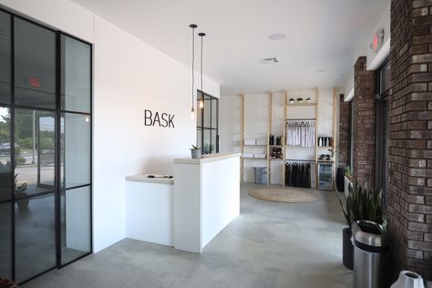 Bask Hot Yoga Studio Reception Desk Yoga Studio Reception, Studio Reception Desk, Pilates Studio Design, Modern Yoga Studio, Small Yoga Studio, Studio Reception, Cubicle Style, Yoga Studio Interior, Brick Studio