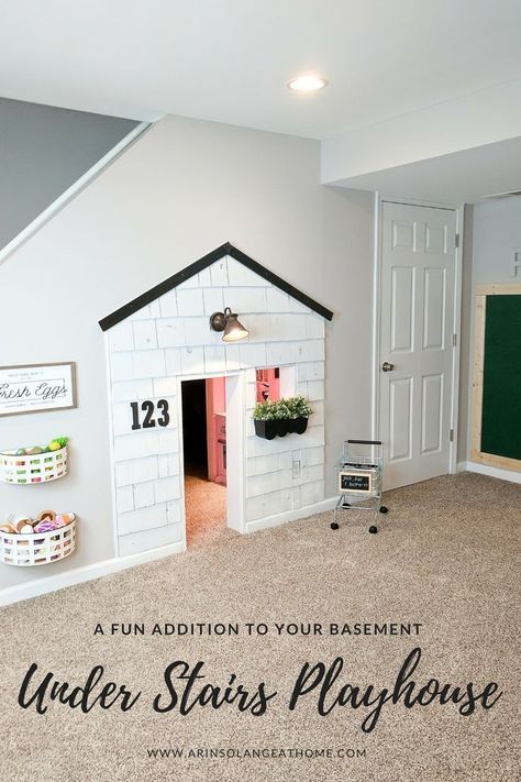 A fun addition to our basement has been this playhouse under the stairs. It is 3 full rooms, and complete with electricity. The update with cedar shake shingles is up on the blog, so be sure to check it out! https://www.arinsolangeathome.com #playhouse #diy #understairsplayhouse Under Stairs Playhouse, Under Stairs Playroom, Under Stairs Dog House, Room Under Stairs, Diy Playhouse, Basement Playroom, Basement Walls, Basement Bedrooms, Dog Rooms