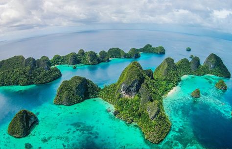 Wayag Islands at Raja Ampat | Papua Explorers Raja Ampat Islands, Water Bungalow, Raja Ampat, Overwater Bungalows, Underwater Life, Remote Island, Paradise On Earth, Seminyak, Enjoying The Sun