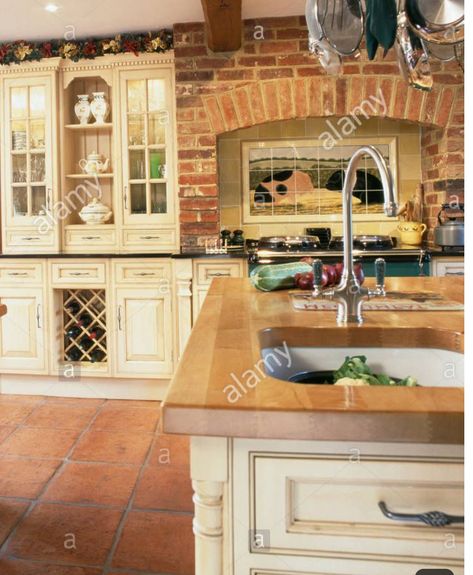 Exposed Brick, Terra Cotta Floor, Wood Counter Tops, Cream Colored Cabinets, Kitchen Terracotta Floor, Cream Country Kitchen, Terracotta Kitchen Walls, Brick Slips Kitchen, Terracotta Kitchen Floor, Terracotta Kitchen, Country Kitchen Flooring, Terracotta Floor Tiles, Contemporary Kitchen Remodel