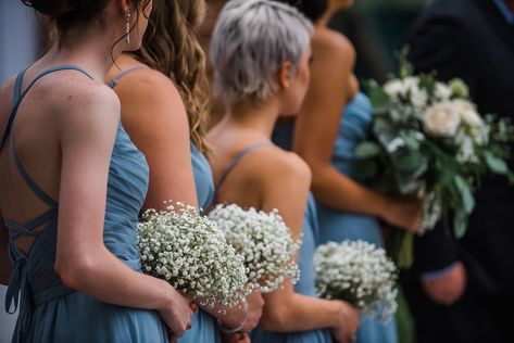 Bridesmaids holding babys breath bouquets with dusty blue dresses Small Blue Bridesmaid Bouquet, Babys Breath Bouquets, Wedding With Baby, Blue Bridesmaid Bouquet, Dusty Blue Dresses, Dusty Blue Dress, Dusty Blue Wedding, Dusty Blue Bridesmaid Dresses, Babies Breath