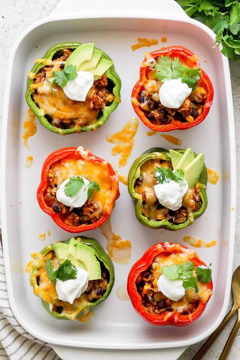 Mexican-Style Stuffed Peppers - Fit Foodie Finds Bell Pepper Stuffed, Pepper Stuffed, Mexican Stuffed Peppers, Stuffed Peppers Recipe, Fit Foodie Finds, Sweet Bell Peppers, Beans And Rice, Fit Foodie, Peppers Recipes