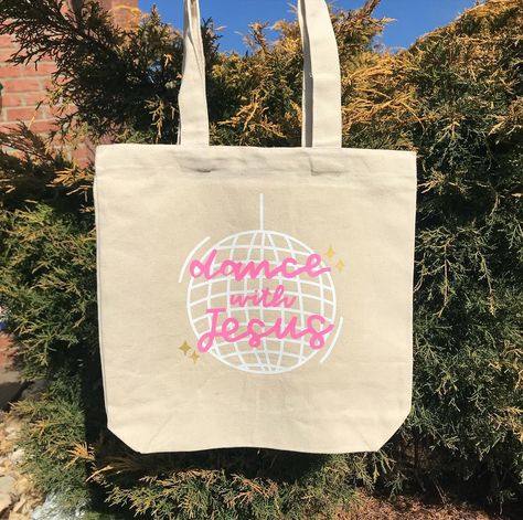 christian tote bags for summer - cute designs that help start conversations about Jesus!! 🩷🫶 get 20% off in my Etsy shop (that includes tote bags!!) through 4/29 🛒💖 click the link in my bio to shop! 🫶 •••••••••••••••• #christian #christiangirl #christianliving #christiantotebags #bible #biblejournaling #biblejournalingcommunity #christianwomen #christianwomencommunity #giftsformom #christianapparel #biblejournalinglife Christian Tote Bags Diy, Bible Bag Painting, Jesus Tote Bag Painting Ideas, Bible Bag Ideas, Bible Tote Bag Diy, Christian Tote Bag Design Diy Paint, Bible Bags Totes Diy Paint, Bible Tote Bag Painting Ideas, Tote Bag Painting Ideas Christian