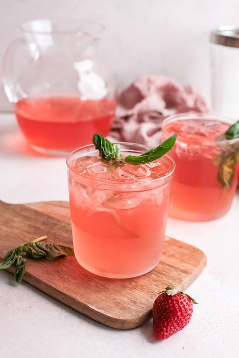 I’ll never get tired of sangria, margarita or other refreshing summer cocktail recipes. But I still love finding brand new cocktails to try out! This strawberry gin rickey cocktail is a sweet and fruity cocktail with gin. You need to make a strawberry basil simple syrup and then you can combine it with the other ingredients. This is a tasty variation on a classic gin rickey to try this summer. You will love this summer cocktail with fresh strawberries. #gin #cocktail #rickey #strawberry #basil Strawberry Basil Simple Syrup, Rickey Cocktail, Basil Strawberry, Strawberry Cocktail Recipe, Gin Rickey, Fruity Cocktail Recipes, Basil Simple Syrup, Sugar Free Cocktails, Strawberry Gin