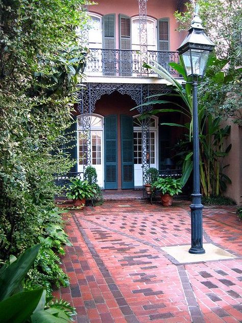 New Orleans French Quarters Courtyard | Courtyard in the French Quarter, New Orleans | Places I want to go Courtyard French, Tiled Courtyard, New Orleans Interior, French Quarter New Orleans, New Orleans French Quarter, New Orleans Homes, Garden District, The French Quarter, Brick Road