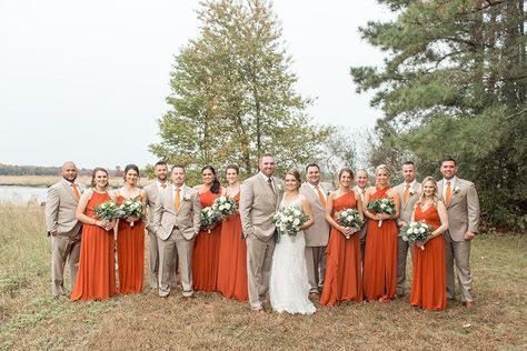 Orange & Tan Autumn Wedding at Eagle Manor | Wedding party in burnt orange dresses and tan suits at Eagle Manor Burnt Orange Groomsmen Attire Bridesmaid Dress, Burnt Orange Wedding Theme Groomsmen, Wedding Suits Groom Burnt Orange, Tan And Burnt Orange Groomsmen, Autumnal Wedding Suits, Tan And Burnt Orange Wedding, Tan And Orange Wedding, Burnt Orange And Tan Wedding, Burnt Orange Weddings Groomsmen