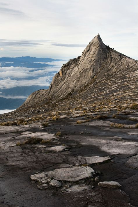 The top of Mount Kinabalu on the island of Borneo. #Borneo #Asia #mountain Mount Kinabalu Wallpaper, Kinabalu Mountain, Mount Apo, Mt Kinabalu, Mount Kinabalu, Sabah Malaysia, Fantasy Realm, Mountain Background, Mountain Illustration