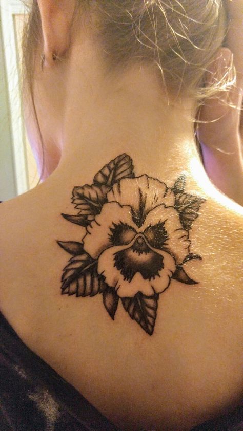 Pansy flower tattoo on the neck black and white Pansies Tattoo Black And White, Wild Pansy Tattoo, Pansy Tattoo Black And White, Violet Tattoo Black And White, Pansy Tattoos, Pansy Flower Tattoo, Pansy Parkinson Aesthetic, Parkinson Aesthetic, Tattoo Fillers