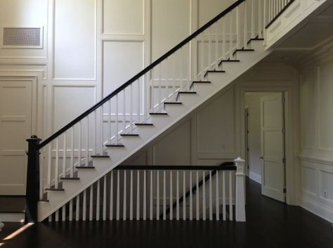 open staircase to basement and floor to ceiling wainscoting Stacked Staircase Open, Stacked Stairs Open, Basement Stairs At Entryway, Open Stair Railing To Basement, Open Concept Basement Stairs, Three Story Staircase, Stairs To Basement Ideas, Stacked Stairs, Stacked Staircase