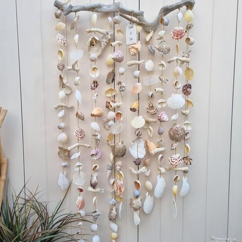 Reserved - Large Shell Curtain, Coastal Wall Hanging, Shell Wind Chime, Shell Wall Decor, Coastal Decor, Beach House Decor This lovely large coastal wall hanging 'Found at Sea' is made of many different seashells in beautiful colors and driftwood hanging on a white washed grapevine Easy to hang and perfect for your indoor or outdoor space! total height approx.: 130cm / 51.18'' (height grapevine - bottom shell approx. 110cm / 43.31'') width approx.: 60cm / 23.62'' Shell Curtain, Coastal Country Decor, Shell Wall Decor, Seashell Wind Chimes, Fun Fall Decor, Shell Wind Chimes, Shell Decorations, Paper Wall Hanging, Sea Decor