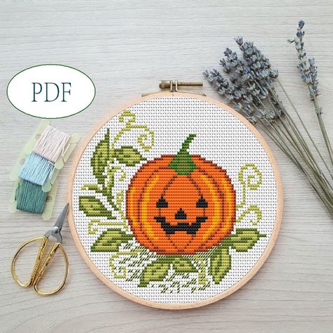 This Halloween pumpkin cross-stitch pattern is perfect for all skill levels.  Stitches: 80 x 62  Size: 14.51 x 11.25 cm (5.71 x 4.43 inches) Colors: DMC This PDF file includes: - High quality design photo, embroidery scheme, symbol key Materials you will need: * 7" or 8" embroidery hoop * embroidery fabric (14 count Aida) * Embroidery needles * Embroidery thread (7 colors) * scissors * drawing pencil PLEASE NOTE *This is a printable pattern only, nothing will physically be sent to you. Scissors Drawing, Pumpkin Cross Stitch Patterns, Photo Embroidery, Pumpkin Cross Stitch, Embroidery Diy, Easy Embroidery, Halloween Cross Stitches, Halloween Embroidery, Small Design