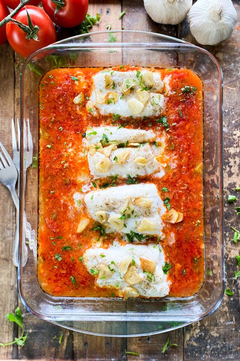 Spanish Baked Cod in a Delicious Tomato Sauce | Quick & Easy Recipe Baked Cod In Tomato Sauce, Spanish Tomato Sauce, Cod In Tomato Sauce Recipe, Spanish Cod Fish Recipes, Spanish Fish Recipes, Spanish Entrees, Cultural Recipes, Easy Spanish Recipes, Catalan Recipes