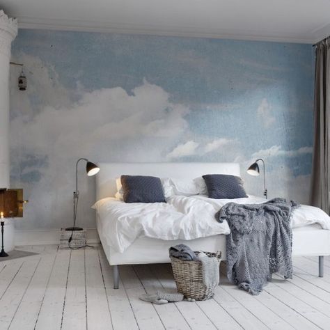 Blue and white cloud wallpaper behind a bed Wall Cloud, Soothing Bedroom, Mad About The House, Scandinavian Wallpaper, Bedroom Murals, White Bed, Cloud Wallpaper, Concrete Tiles, Wooden Slats