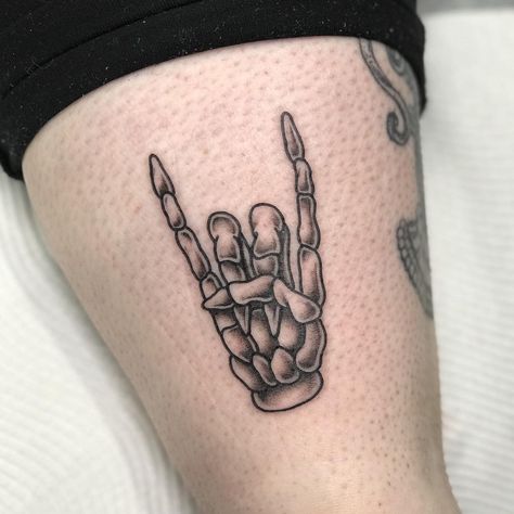 Skeleton hand tattoo Skeleton Rock Hand Tattoo, Rock Hand Tattoo, Skeleton Rock Hand, Rock And Roll Tattoo, Hand Tattoo Images, Shading Tattoo, Side Hand Tattoos, Skull Hand Tattoo, Rock Tattoo