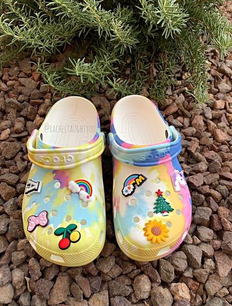 #crocs #jibbitz #tiedye Tye Dye Crocs With Jibbitz, Crocs Jibbitz Aesthetic, Cute Crocs Jibbitz Ideas, Crocs With Jibbitz, Cool Crocs, Yellow Crocs, Crocs Aesthetic, Brown Ugg Boots, Crocs With Charms