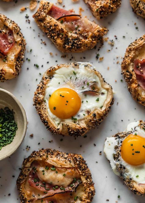 These mini croque madame galettes with everything bagel crust combine two French recipes for a delicious savory breakfast or brunch! Mini Galette, Make Ahead Brunch, Black Forest Ham, Runny Eggs, Galette Recipe, Egg Wrap, Croque Madame, French Recipes, Holiday Breakfast