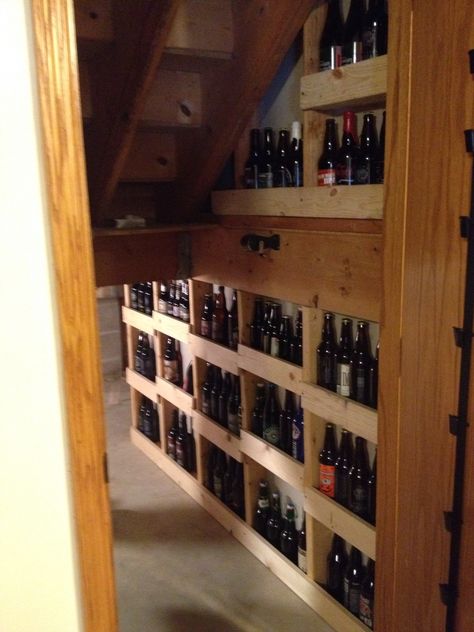 I like the shelving to prevent the beer bottles from falling Beer Bottle Storage Ideas, Beer Bottle Storage, Brewery Storage, Beer Storage Ideas, Canning Closet Under Stairs, Under Stairs Whisky Storage, Basement Brewery, Cheese Cellar, Brew Room