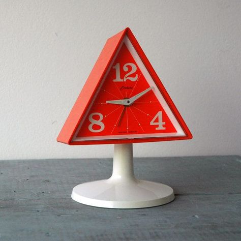 endura triangle clock (1960s) Triangle Shape Objects, Triangle Objects, Retro Electronics, Cool Clocks, Clock Vintage, Day Glow, Drawing Wallpaper, Keramik Design, Orange You Glad