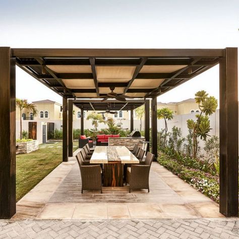 Pergolas are great for Al Fresco dining or just chilling out with family and friends. You can either connect a pergola to the main house or have a freestanding one in your garden. Wood, wood composites, and metal are frequently used in modern pergola designs. House With Pergola, Modern Pergola Designs, Garden Wood, Modern Pergola, Just Chilling, Pergola Designs, Al Fresco Dining, Composite Wood, Wood Wood