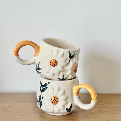 3D Daisy Cup Set (Available in Set of 2, Set of 4 and set of 6) Brighten up your tea time with your dear ones or your refreshing morning coffee with these modern yet artistic ceramic cup set. All the cups are handmade using some of the finest clays, that will enrich your serving experiences. Shop now WhatsApp +91-9779926125 for more details and order or email us at contactus@pankhhari.com . . . #homedecor #kitchenessentials #kitchencupset #teacupset #flowercupset #flowercup #teacups #s... Kitchen Cups, Flower Cup, Cup Set, Ceramic Cup, Tea Cup Set, Cupping Set, Ceramic Cups, 2 Set, Morning Coffee