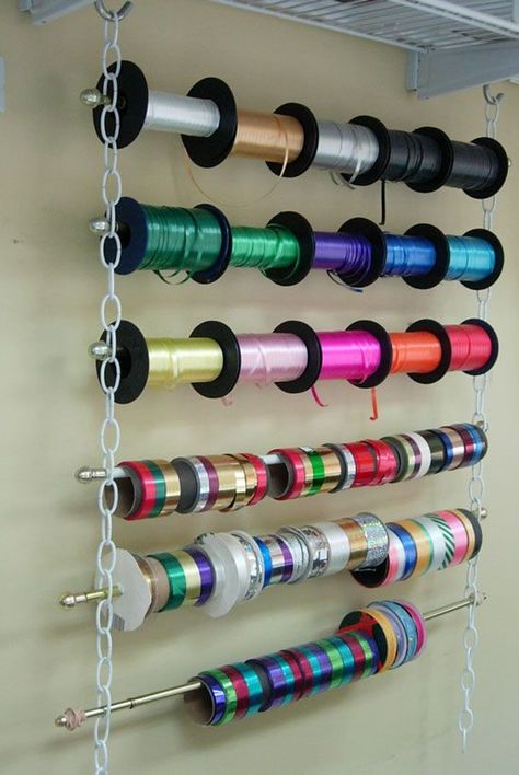 Easy-Ribbon-Holder o man why haven't i thought of this?! looks super cheap and easy. i have chain! i have rods/dowels! geez #Ribbonstorageideas How To Store Ribbons Storage Ideas, Wrapping Room, Showcase Ideas, Ribbon Organizer, Room Organizers, Crafts Storage, Gift Wrapping Station, Ribbon Holders, Wrapping Paper Storage