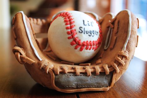 Baseball mit for the top of a baby shower cake. Made from rice crispy treats and covered in modeling chocolate. Baseball Glove Cake, Baseball Baby Shower Cake, Baseball Cupcakes, Baseball Theme Birthday, Baseball Baby Shower Theme, 8th Birthday Cake, Baseball Cake, Sculpted Cakes, Fondant Cake Toppers