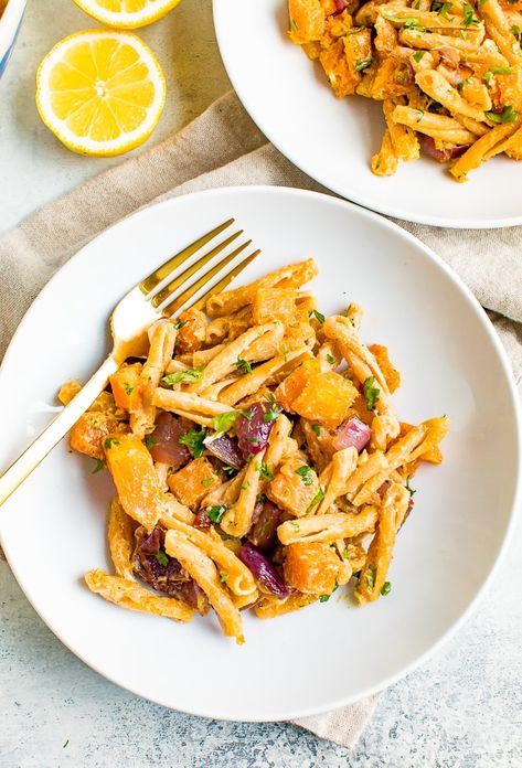 This cozy roasted butternut squash pasta is served with a zesty lemon tahini sauce and makes for a comforting fall/winter meal! #pasta #butternutsquash #eatingbirdfood Fall Pasta Dishes, Autumn Pasta Recipes, Lemon Tahini Sauce, Eggplant Pasta, Fall Pasta, Turkey Tetrazzini, Squash Pasta, Butternut Squash Pasta, Meatless Main Dishes