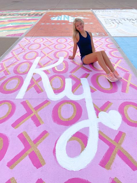 xoxo parking spot painting preppy art pink gold senior 2022 art parking spot painting paint your parking spot ideas Cute Parking Spot Painting Ideas, Highschool Parking Spot Ideas, Painted Parking Spaces Ideas, Senior Year Planning, Parking Space Ideas, Parking Lot Painting, Senior Parking Space Ideas, Senior Year Things, Senior Year Fun