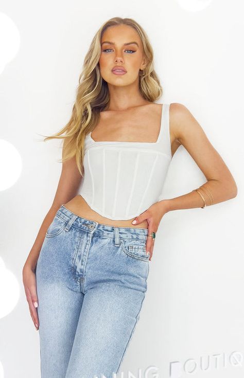 Felicity White Corset Top – Beginning Boutique US Corset Top And Jeans, White Corset Top, Corset Shirt, Corset Style Tops, White Corset, Purple Skirt, Beginning Boutique, Corset Style, Women Corset