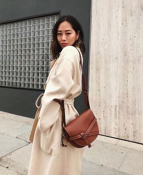 The Gate Shoulder Bag by #Loewe is the perfect fall bag with a fold over top knotted front belt detail and adjustable shoulder strap. Shop @songofstyles look at italist.com #italisticon #italist Loewe Gate Bag, Vetements Hoodie, Bag Wishlist, Aimee Song, Dream Bag, It Bags, Reversible Coat, Loewe Bag, Faux Fur Coats