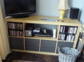 IKEA Hackers: Easy (really easy) way to change Expedit Shelving into a media centre Kallax Printer Ikea Hacks, Kallax Upgrade, Hack Tv, Expedit Hack, Kallax Ideas, Modern Media Center, Ikea Hack Living Room, Ikea Besta Cabinet, Small Bedroom Hacks