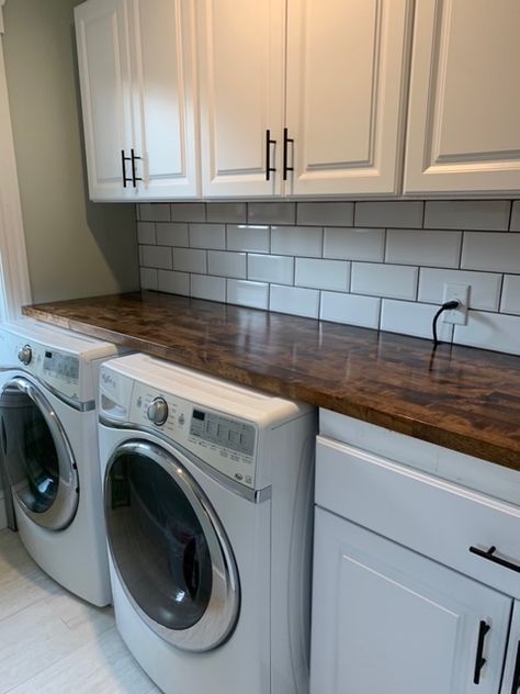 White Subway Tile Laundry Room, Butcher Block Laundry Counter, Laundry Room Butcher Block Counter, White Cabinets Butcher Block Counter, Butcher Block Laundry Room, Stained Butcher Block Countertops, Subway Tile Laundry Room, Basement Mudroom, Stained Butcher Block