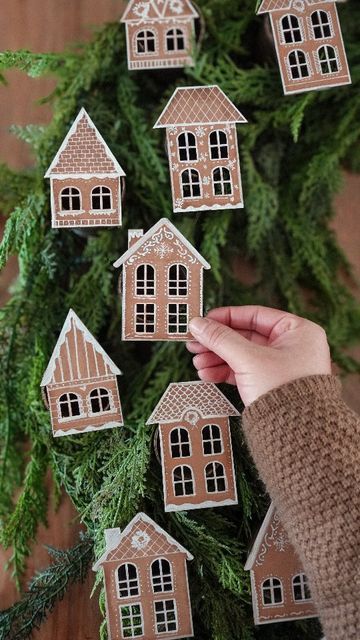 Sarahli Wilcox on Instagram: "Are you ready for a Christmas countdown?! 🎄

If you’re looking for an advent calendar, look no further! I had the idea of combining my favorite holiday tradition and making it into a wreath, and let me tell ya, the result did not disappoint.

To recreate this this Advent Wreath Calendar, comment "advent", and I'll send you a DM with a link 🔗 

Main Supplies >>>

• 23” Dia. Embroidery wooden hoop
• 2” Dia. x 24” L Shipping tubes
• Wooden Houses
• 6’ Garlands (I used 3)
• Floral wiring
• Brown Paints & Paint Markers
• Paint brush & Makeup sponge
• Hand saw or similar
• Mini Hinges
• Hose Clamp & Spring Clamps
• Ruler, Hot glue & E6000
• Number Stickers, Decorative ornaments /Ribbon
• Sandpaper

DIYer Notes____________________

I spread out the shipping tubes a Wreath Advent Calendar, Advent Calendar Wreath Diy, Wreath Calendar, Advent Calendar Wreath, Christmas House Diy, Diy Advent Wreath, Advent Garland, Advent Wreath Diy, Advent House